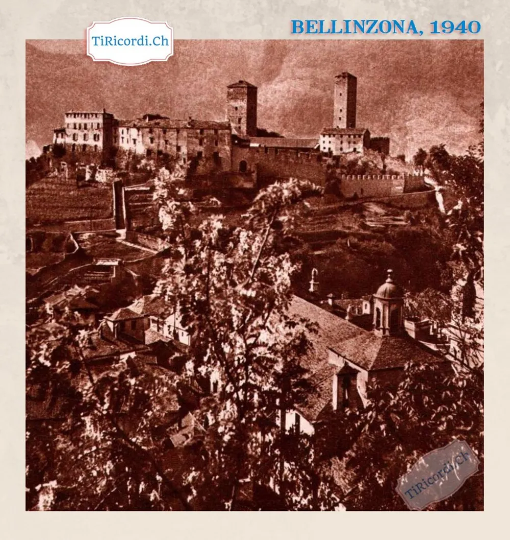 Bellinzona 1940: Castelgrande con le sue due torri, la cinta murata e la cupola della Collegiata visti dall'alto